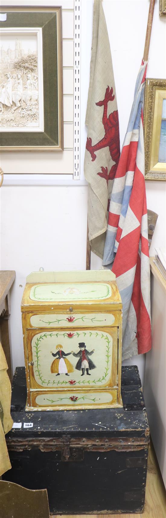 Two flags, two boxes and an easel
